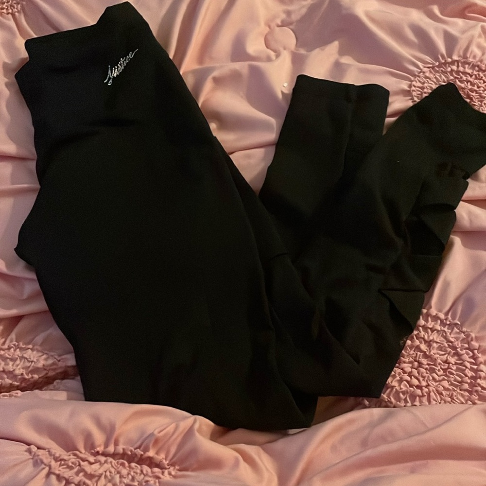 Black, soft, and criss-crossed at the calves for decor.